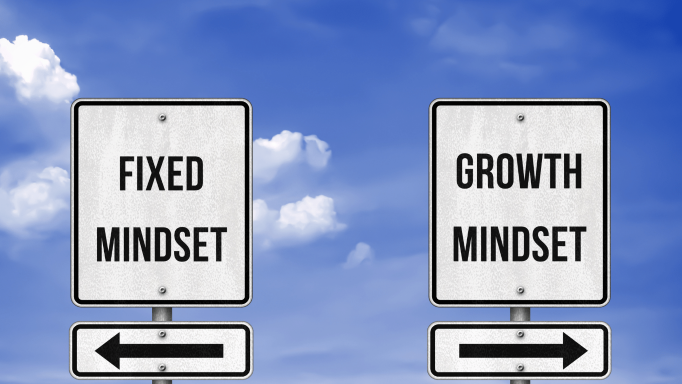 Signs with the words, fixed mindset and growth mindset